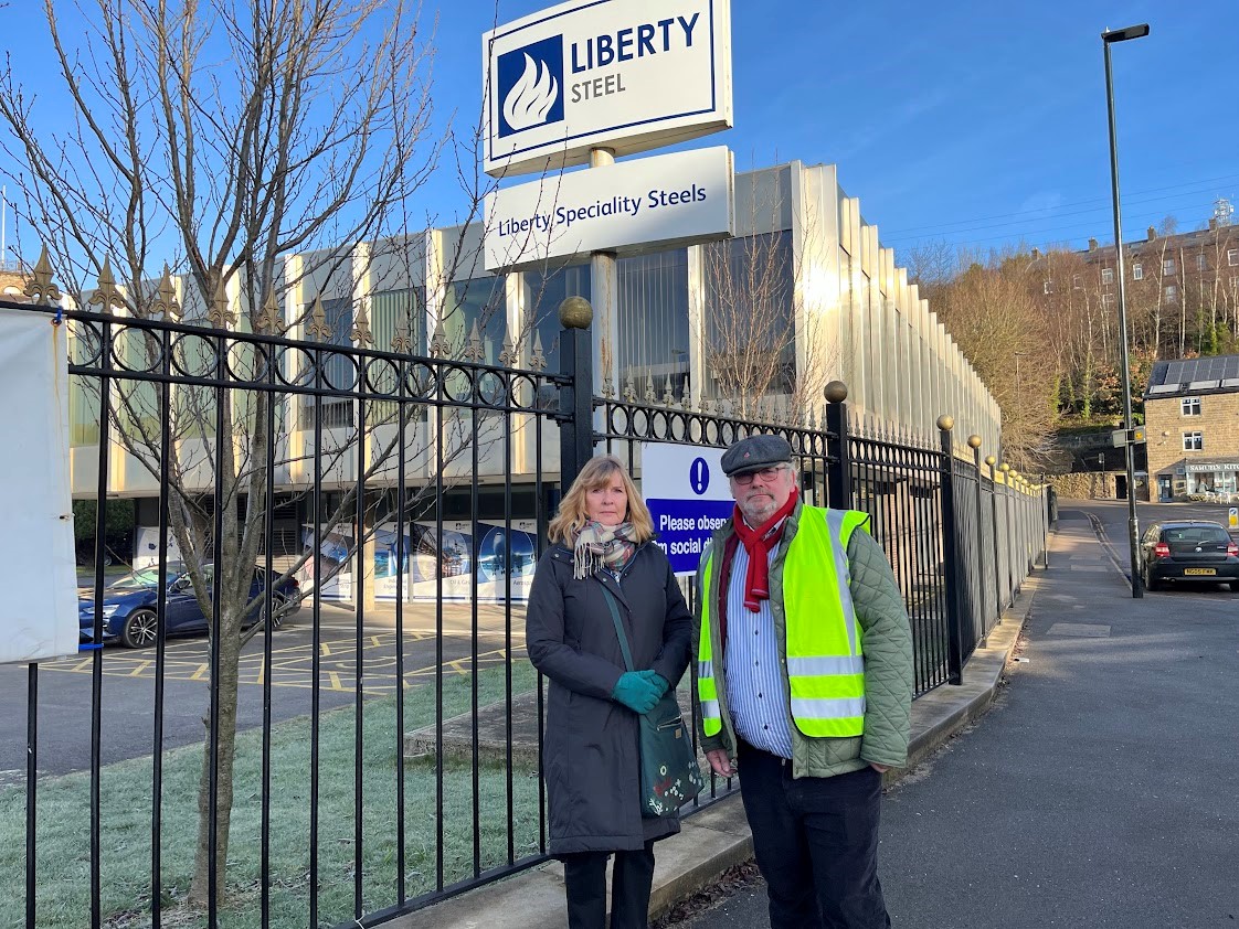 Cllr Terry Fox and Cllr Julie Grocutt stand outside the Liberty Steel building in Stocksbridge