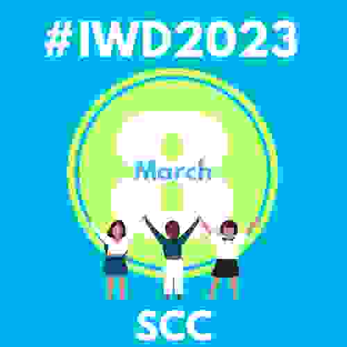 Graphic logo text reads IWD 2023, SCC three characters stand in a pose of celebration hand in hand arms outstretched.