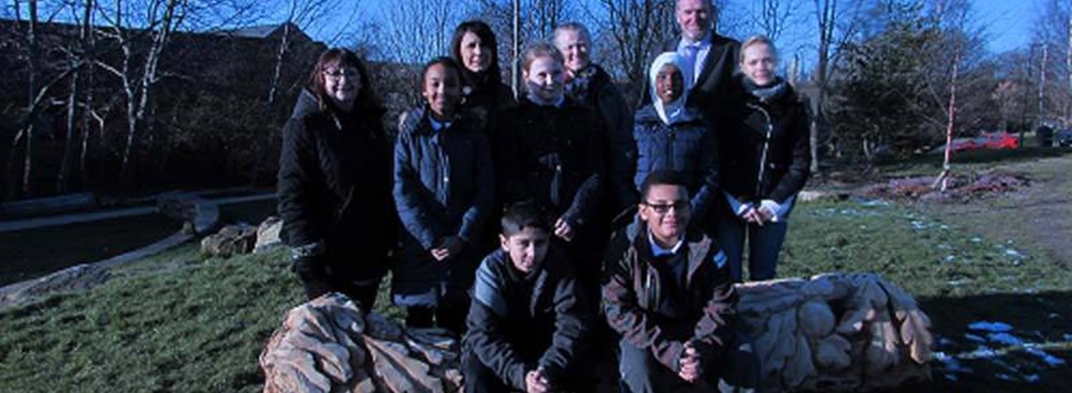 Group of people sat on tree