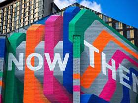Now Then Then Now artwork on the side of building in Sheffield