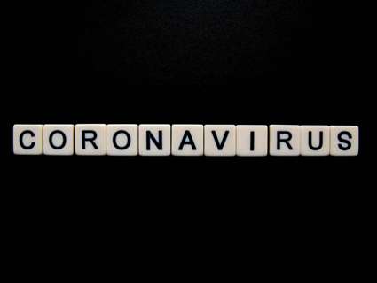 Coronavirus spelled out on scrabble pieces