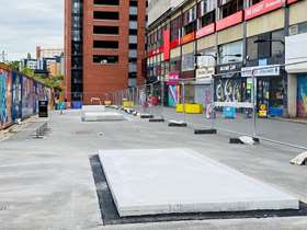 Concrete skate park ramps on street