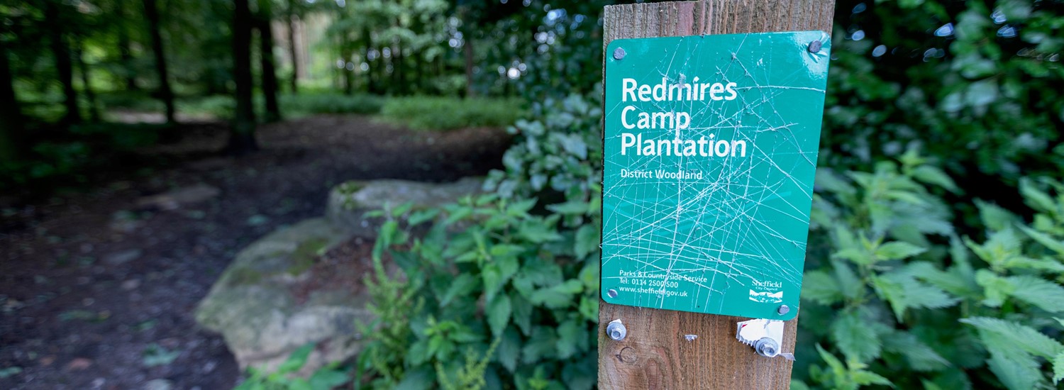 Sign for Redmires Plantation on the edge of the forest