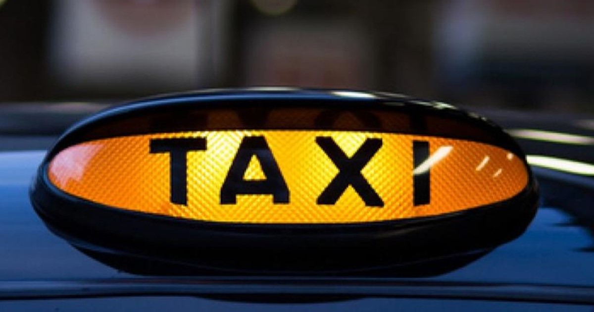 Taxi sign lit up 