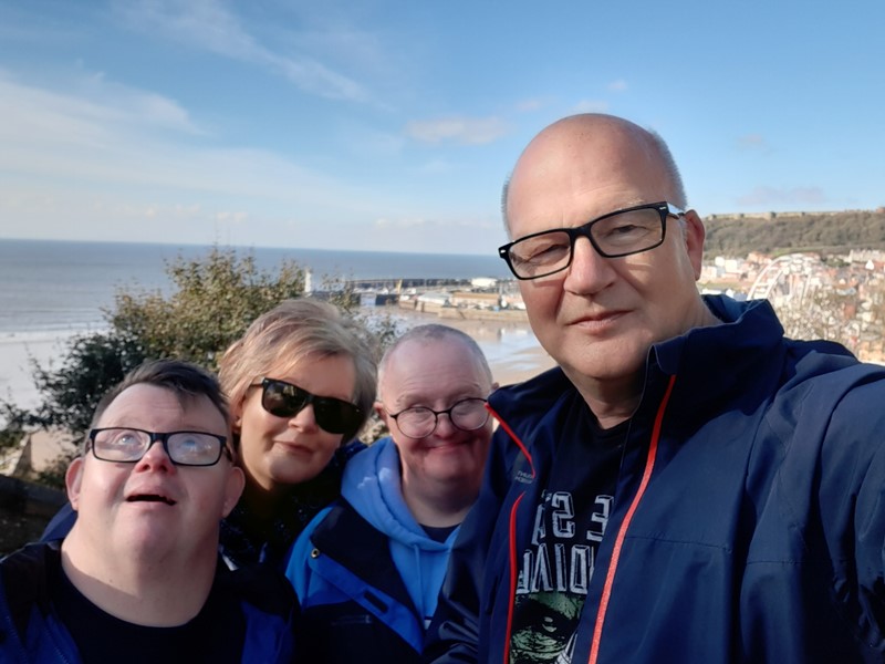 Carers Jill and David, who care for Mark (left) and David (centre)