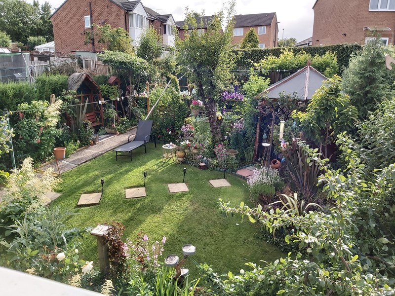 Award winning green garden with paved footpath
