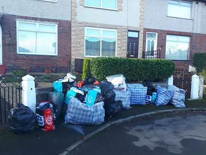Bags of possessions on street after illegal eviction