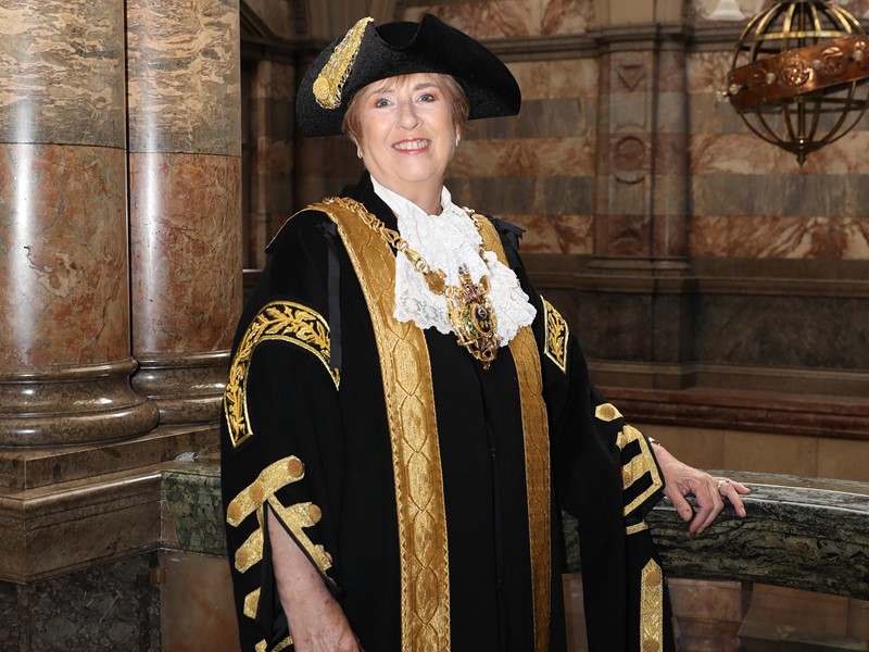 Gail Smith in the council chamber in her mayoral chains of office