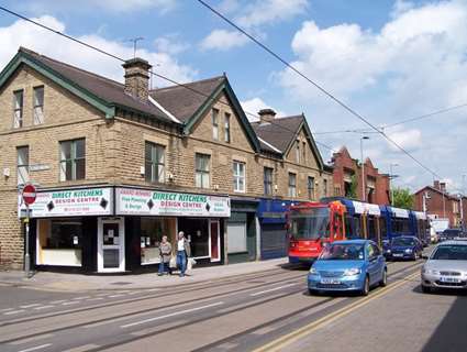 Building and tram tracks on Holme Lane