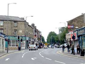 high street road with buildings either side