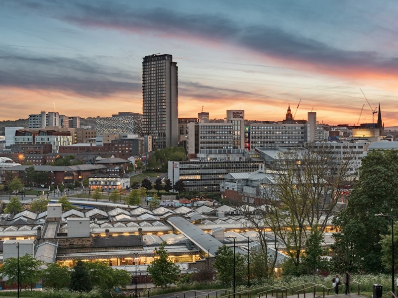 Skyline view of Sheffield buildings with dusky sunset