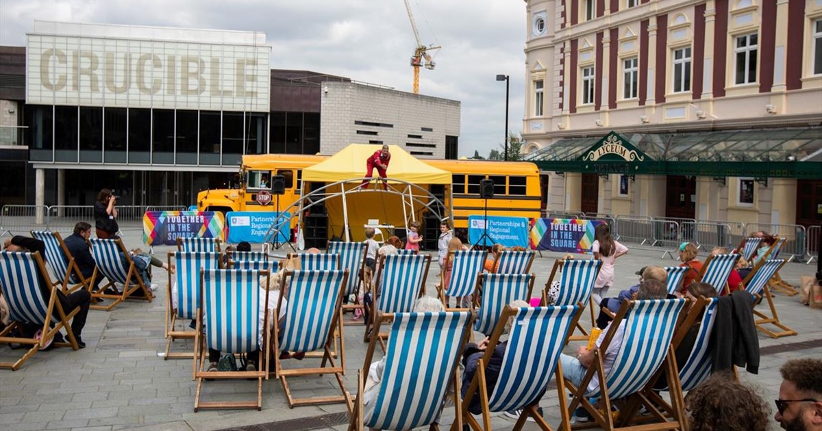 Deck chairs set out in front of theatre