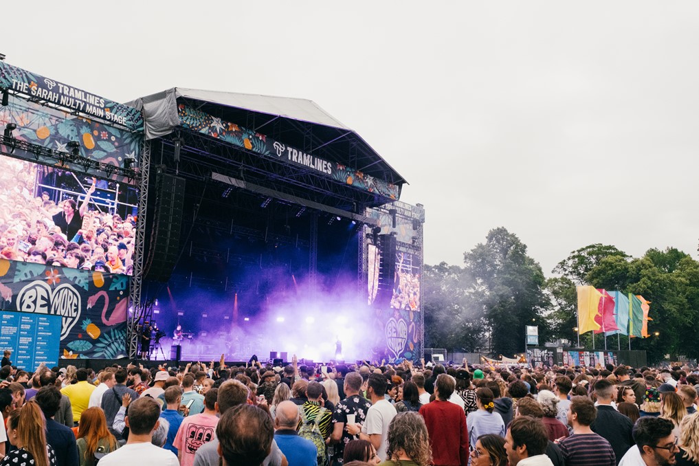 Large crowds of music fans gathered in front of the stage at Tramlines Festival