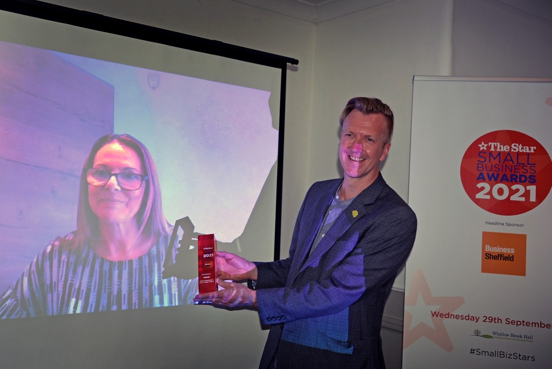Cllr Paul Turpin, Executive Member for Inclusive Economy, Jobs and Skills, presents the Entrepreneur Award to Clear Quality Limited. Debbie Whitehead accepted the award virtually as unfortunately she couldn't be there on the night