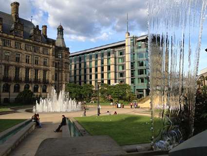 Sheffield Town Hall and Peace Gardens with fountains and Mercure St. Paul's hotel 