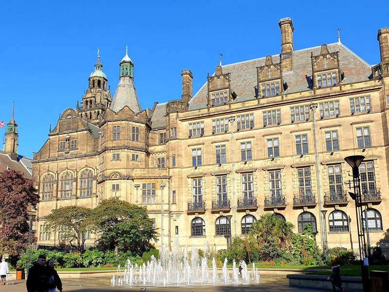 Town Hall stands below a blue sky