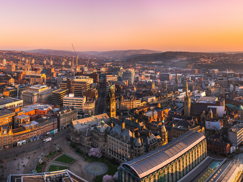 Ariel shot of city centre at sunrise 