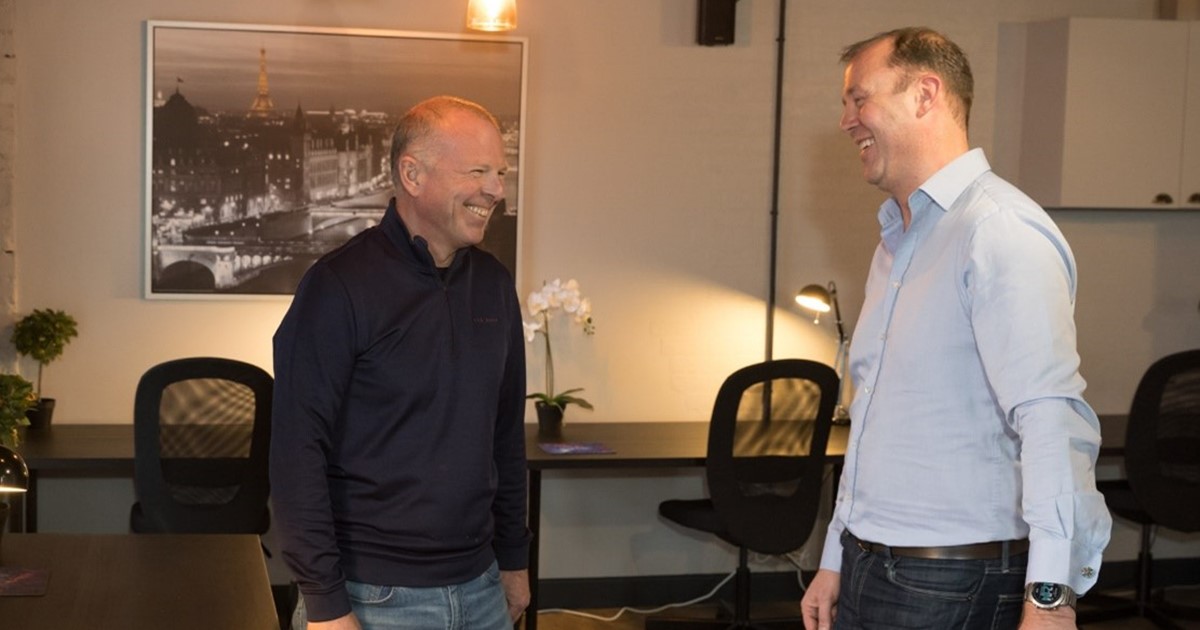 A business officer (right) meets with a business owner (left) in Sheffield