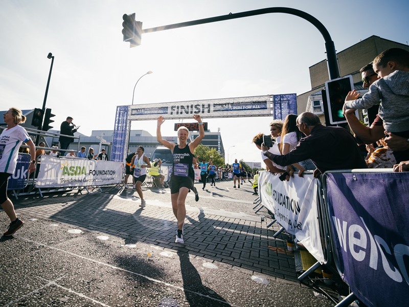 Runners crossing finish line at Sheffield Half Marathon 2021