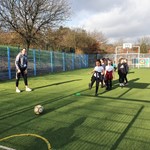 Ellie Wilson from SUFC Women teaches girls at Ballifield Primary School a few tricks