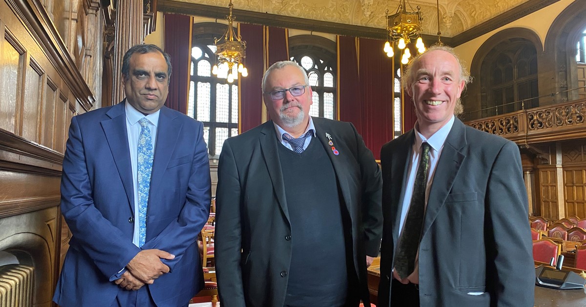 Councillors Shaffaq Mohammed, Terry Fox and Douglas Johnson in council chamber