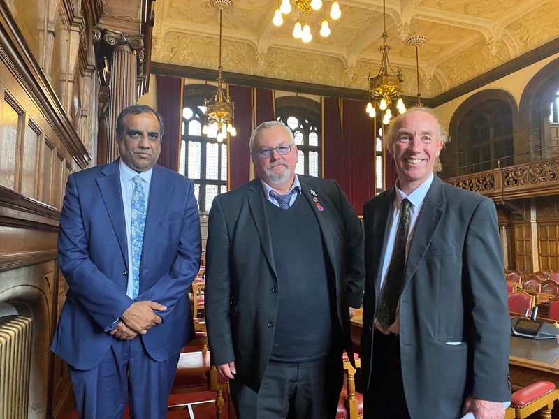 Councillors Shaffaq Mohammed, Terry Fox and Douglas Johnson in council chamber