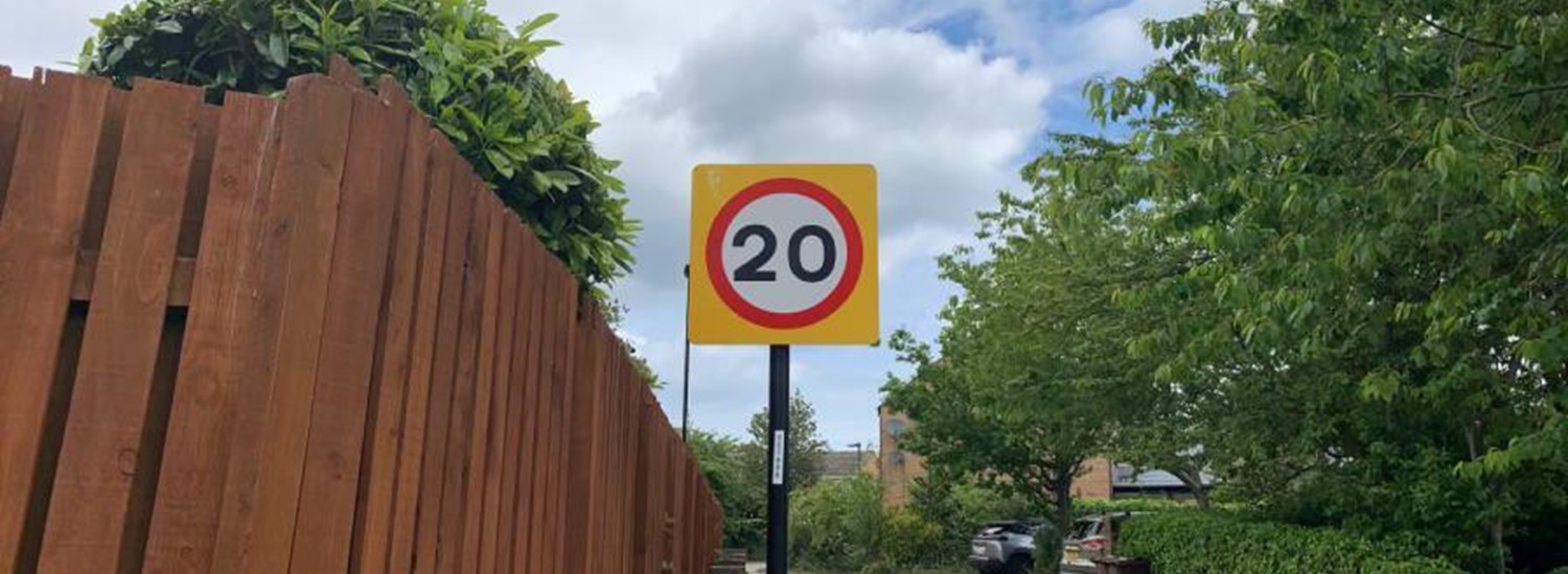 20mph speed limit sign on residential street