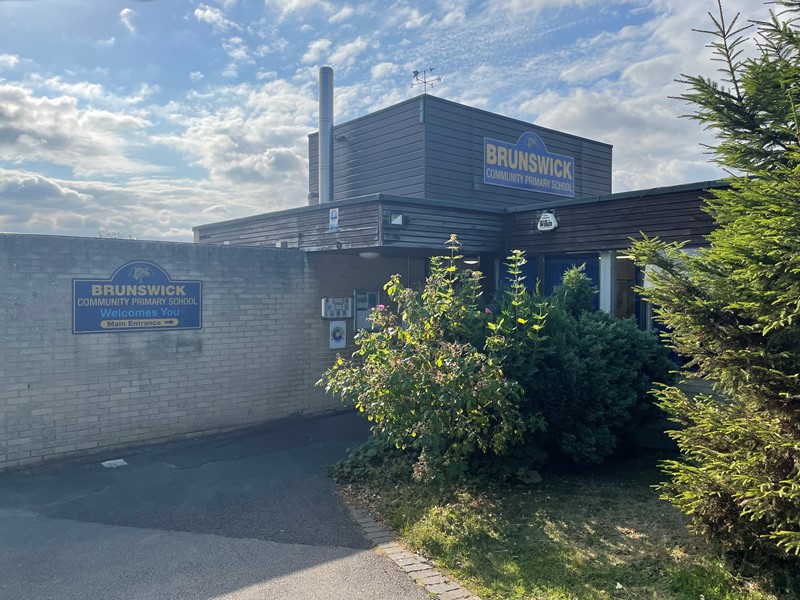 The entrance to Brunswick Primary School on a sunny day