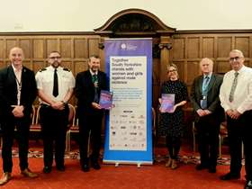 Richard Eyre, South Yorkshire Police, Deputy Lord Mayor, Louise Harrison Walker, Dr. Alan Billings and Steve Lonnia stood holding the charter document