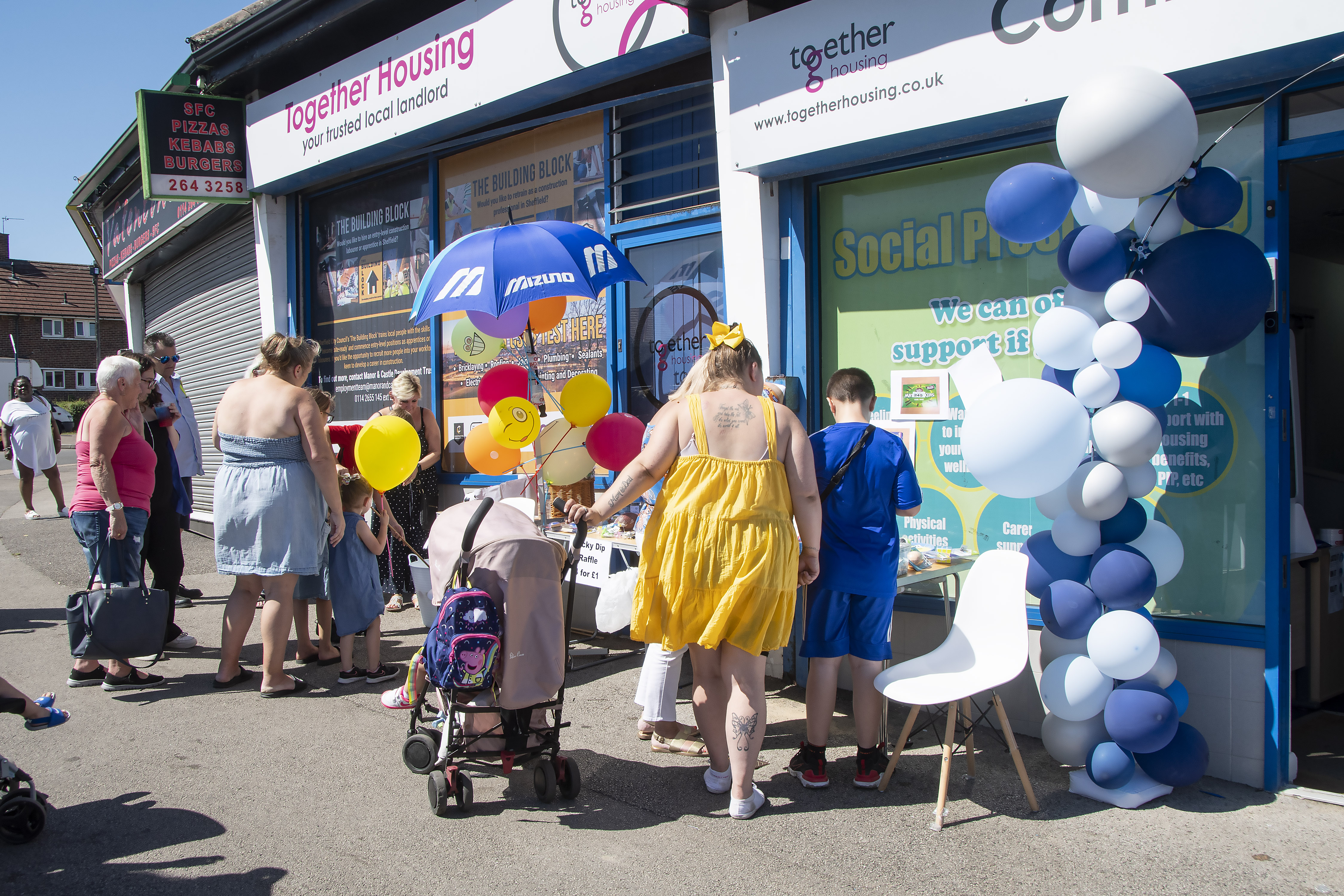 Sheffield locals gather at an event in Manor Park