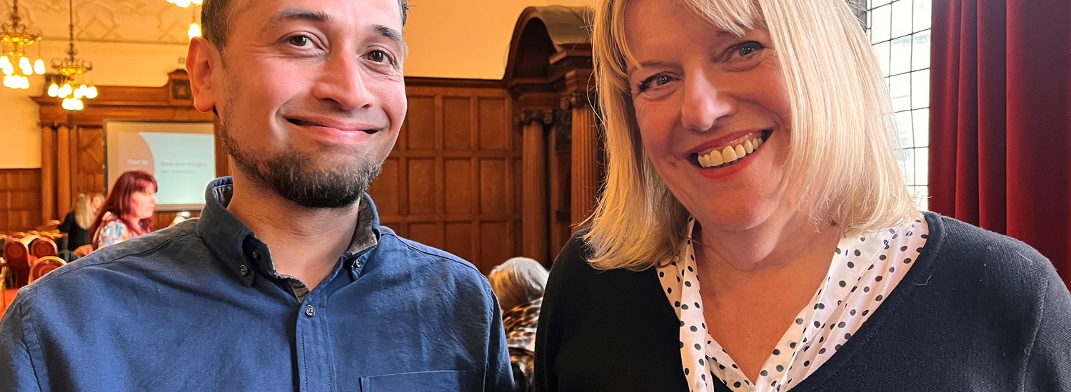 Usman past learner on the left and Elaine Goddard, course coordinator 2001-2005 on the right. Both smiling