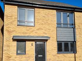 Light brick external house front with grey windows Light brick external house front with grey windows