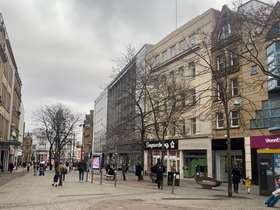 A street scene capturing Fargate in Sheffield