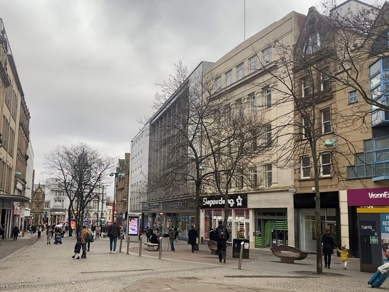A street scene capturing Fargate in Sheffield