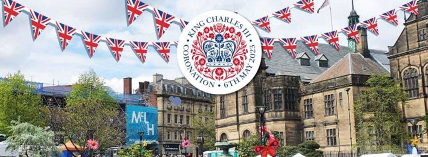 Peace Garden, Sheffield with people sat on the grass and the 'King Charles III Coronation' emblem over the top, infront of the Town Hall