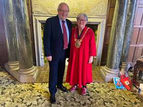 Richard Caborn stood next to Lord Mayor Sioned-Mair Richards in the Lord Mayor's parlour