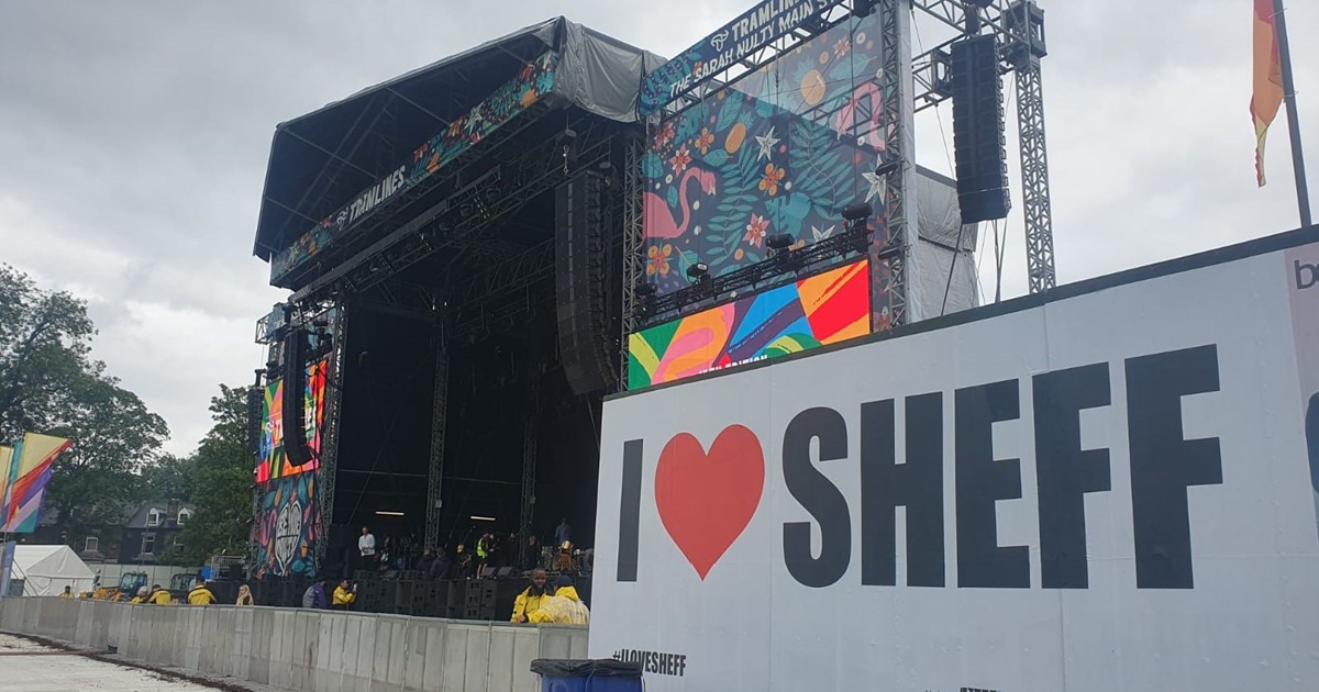 A stage with a sign that says I heart Sheff
