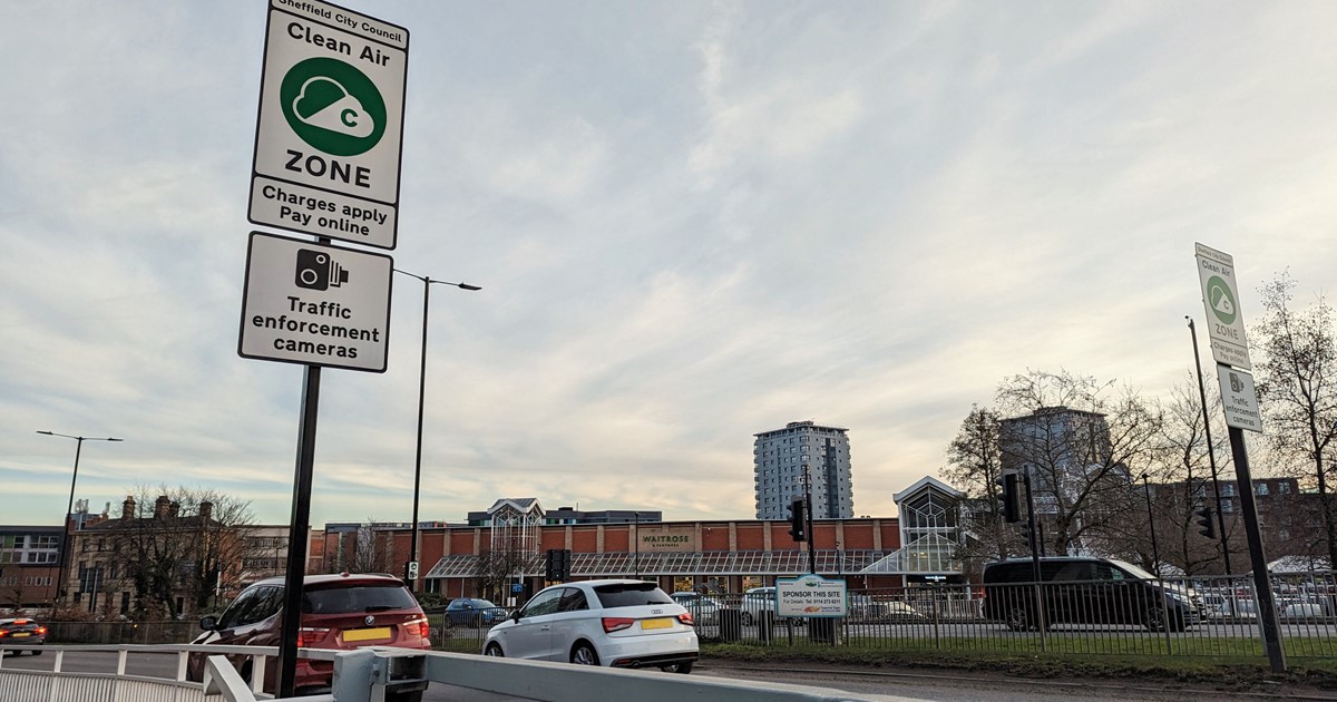 A Clean Air Zone road sign on a busy road in Sheffield