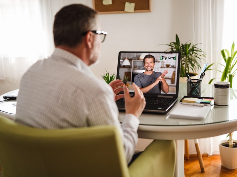 BSL user with SignLive interpreter