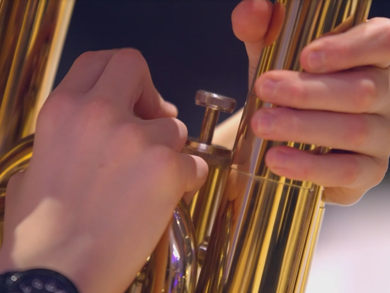 Close up of hands on a trumpet