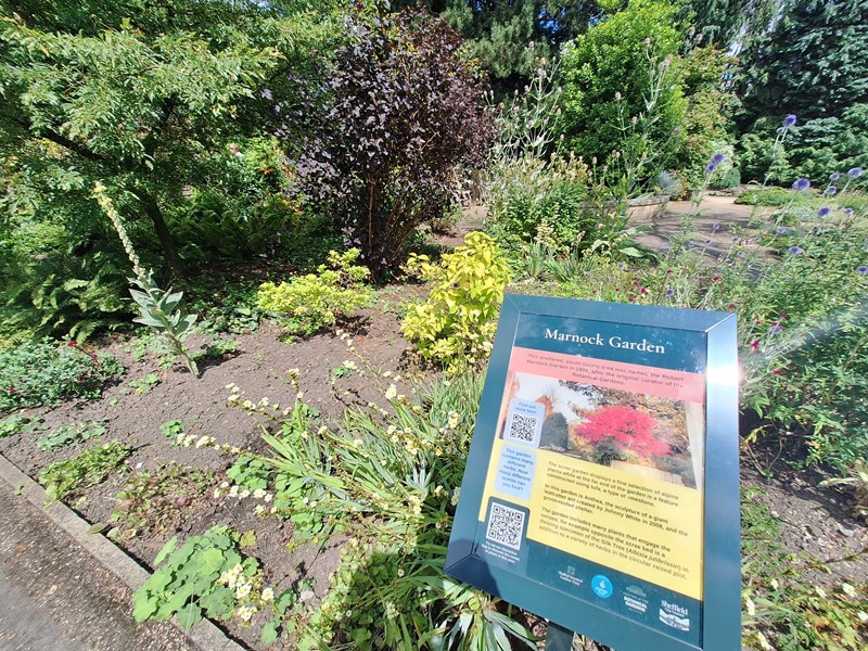 New signage in SBG, in front on plants and flora