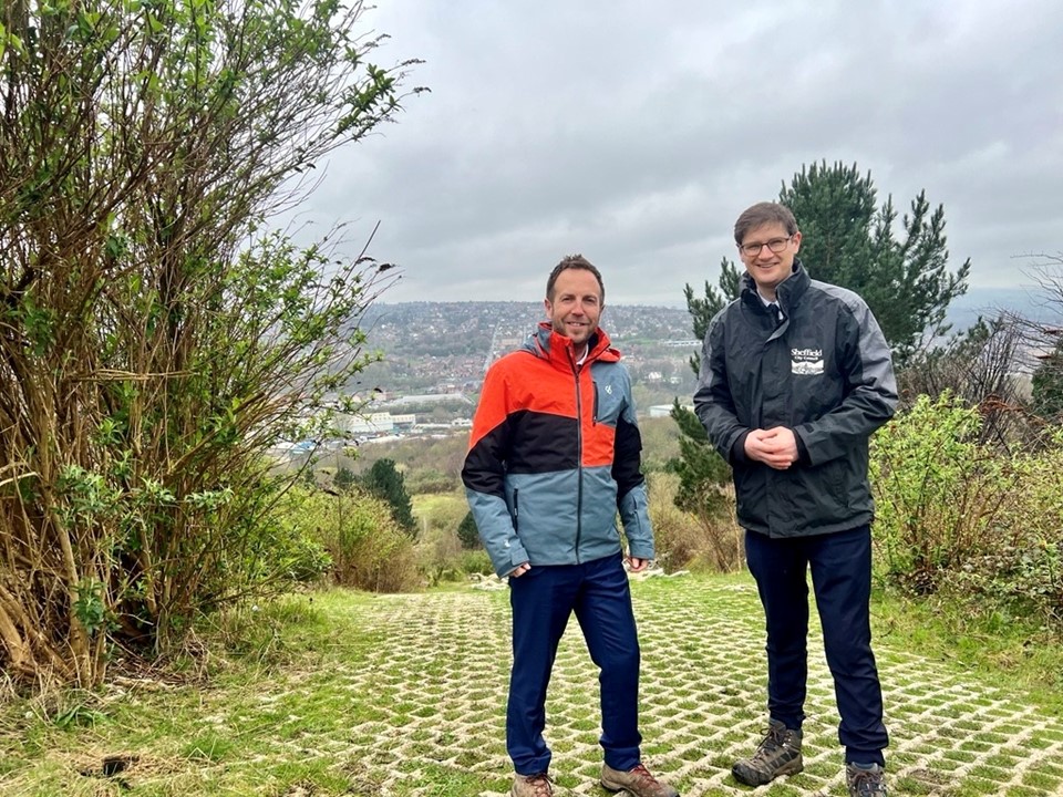 Cllr Ben Miskell and Cllr Tom Hunt stand in Parkwood Springs, at the site of the old ski village on one of the former dry slopes