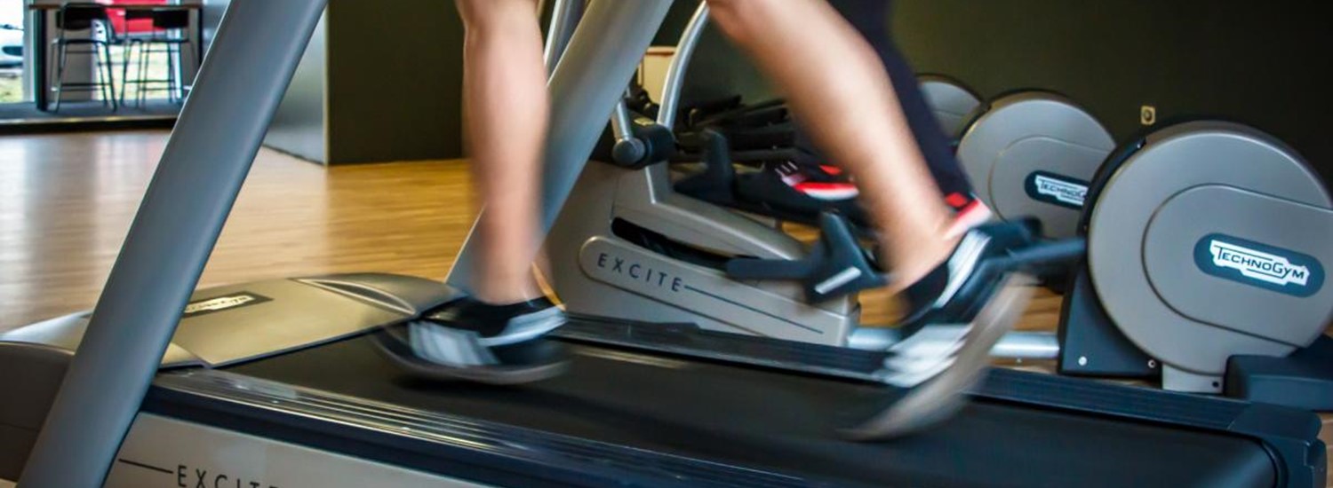 legs running on a treadmill