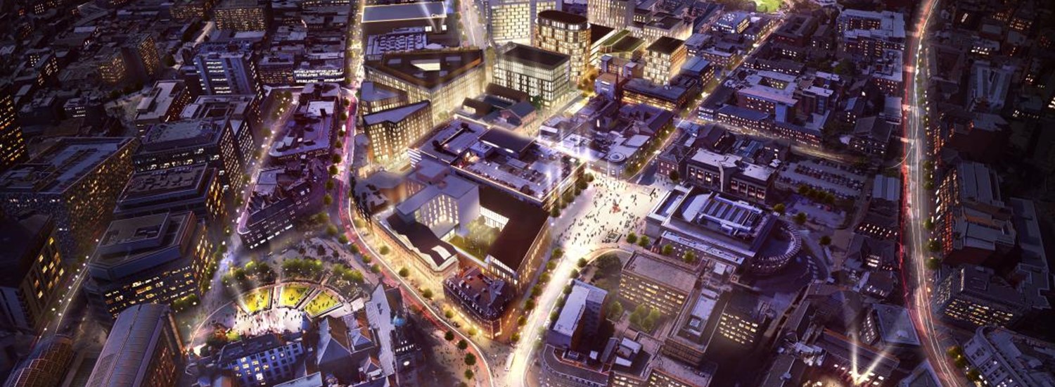 Drone shot of Sheffield city centre lit up at night