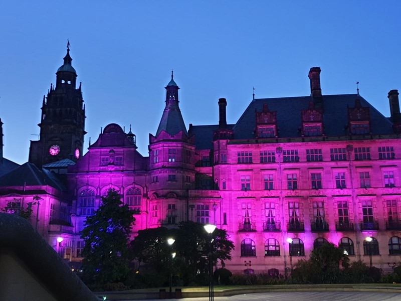 Sheffield Town Hall lit in purple at night