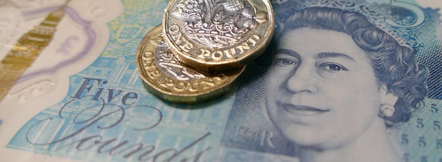 coins and a bank note