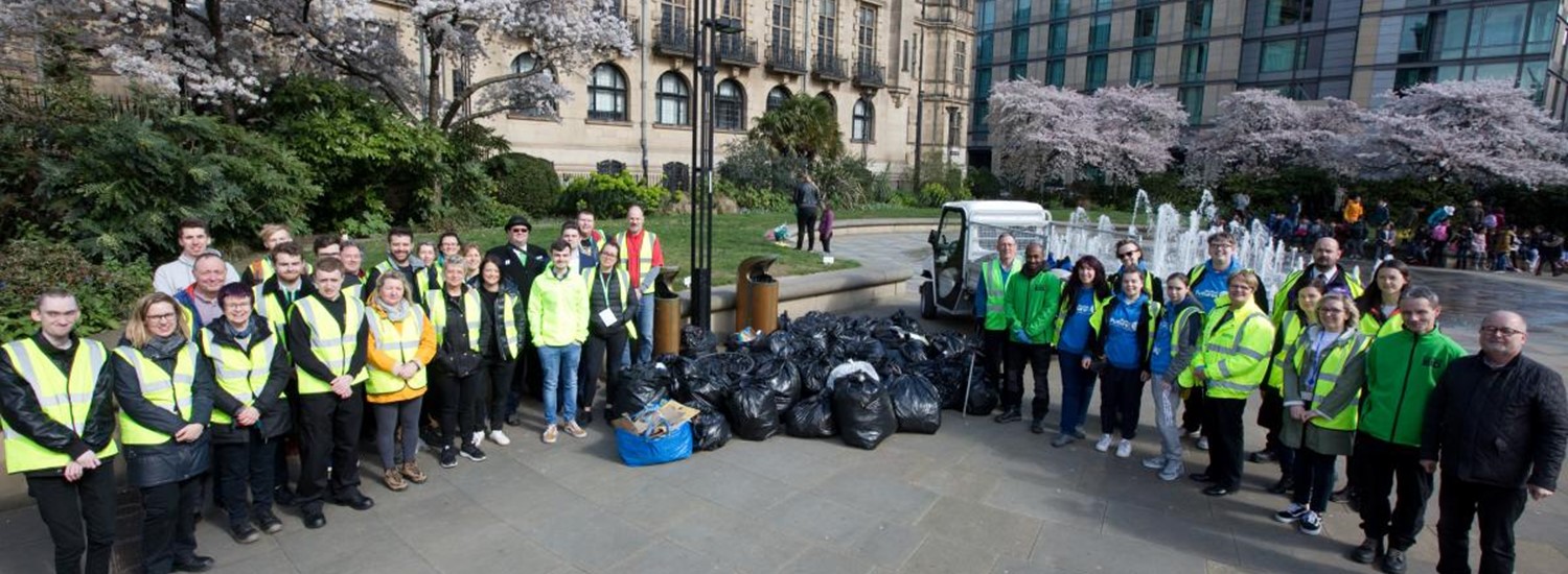 Group of people in Sheffield Peace Gardens ready to spring clean