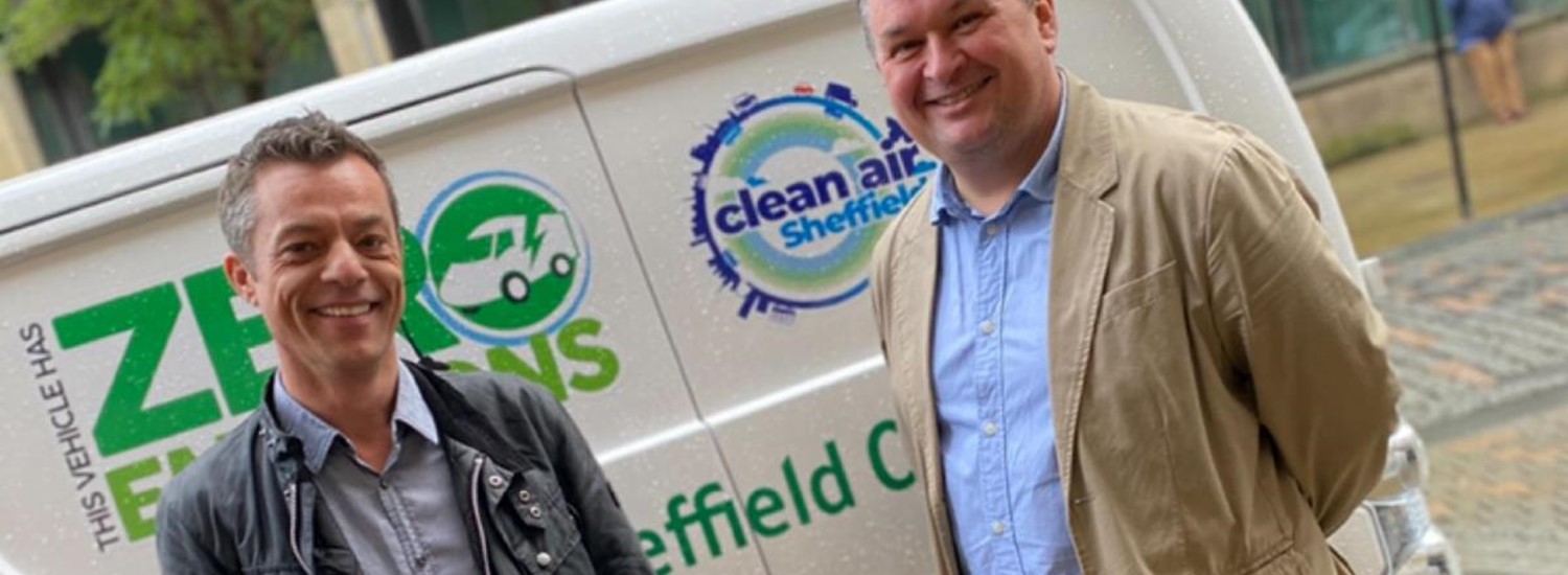 Bob Johnson and Mark Jones in front of electric van
