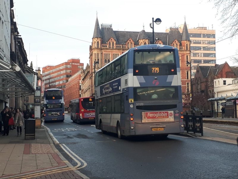 Rear view of a bus travelling on Sheffield road
