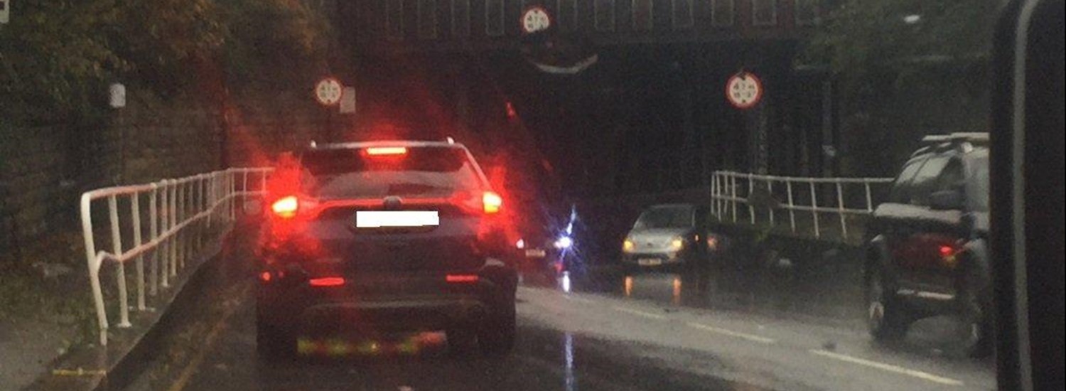 car on a flooded road